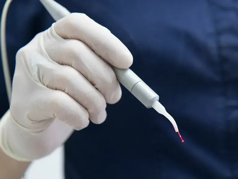 Close up on a surgical micro laser scalpel blade