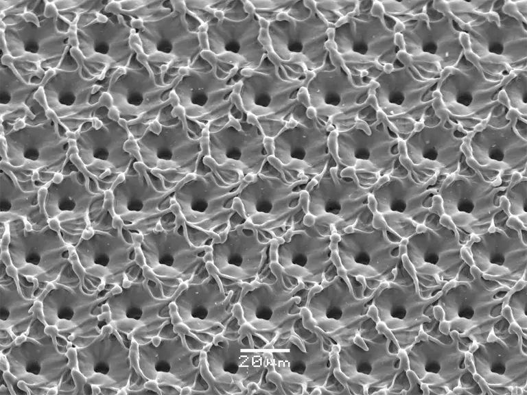 Polymer Micron Hole Drilling