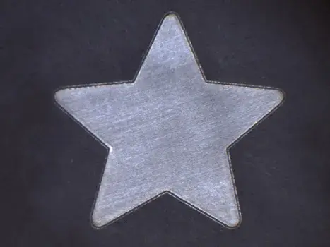 Precision etched star in SiC to a depth of 30 microns