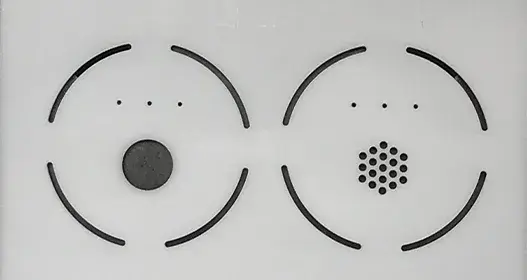 Laser-machined 0.500 um thick PTFE bio-filters with 5mm, 0.6mm, and 0.4mm holes.