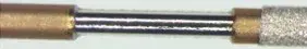Multilayer removal – selective removal of composite from PE and PE from platinum. Overall diameter 120µm.